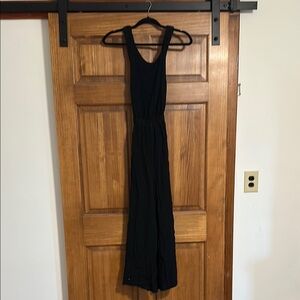 Hem and Thread Black Jumpsuit with Open-back Criss-cross Design